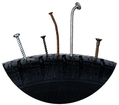 Tire tread with nails and screws puncturing it
